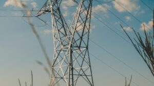 High-voltage transmission line against a clear sky